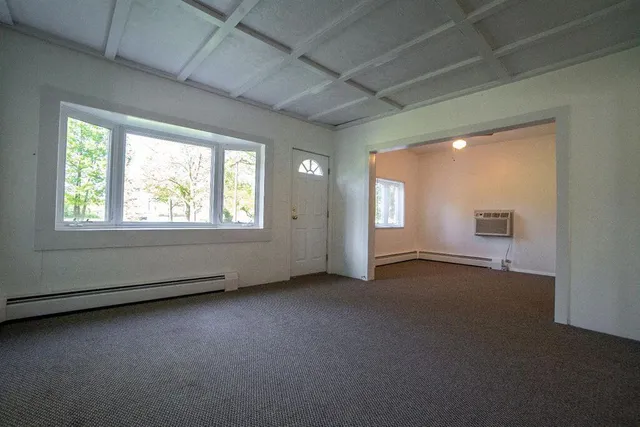 an empty room with windows