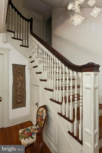 203 Ridgewood Road Baltimore, MD 21210 - Photo 5 of 26 View of graceful staircase to second floor