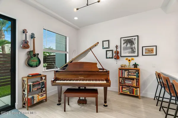 a room with furniture and a wooden floor
