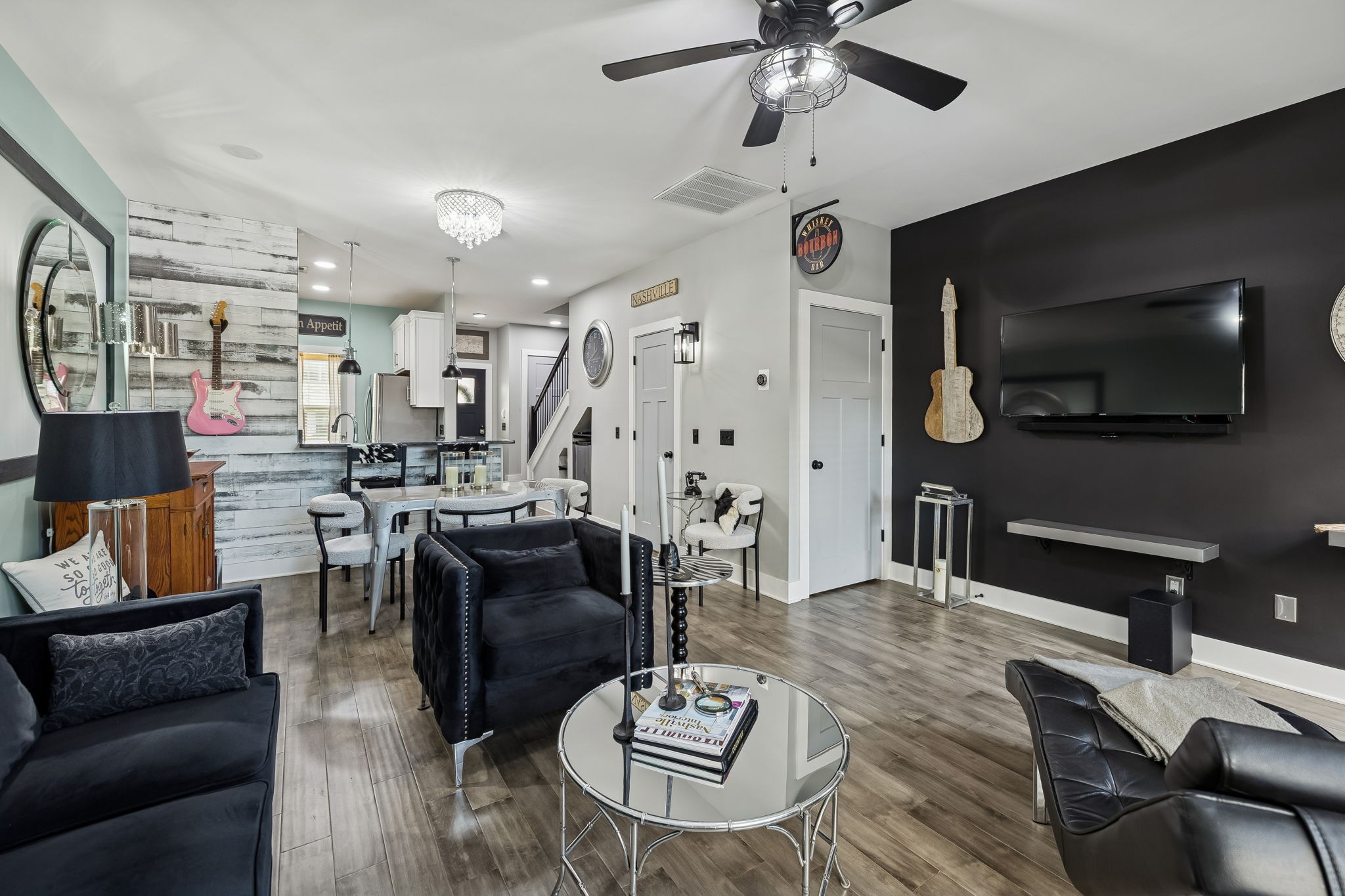 2317 Patrick Avenue Old Hickory, TN 37138 - Photo 16 of 36 a living room with furniture kitchen view and a flat screen tv