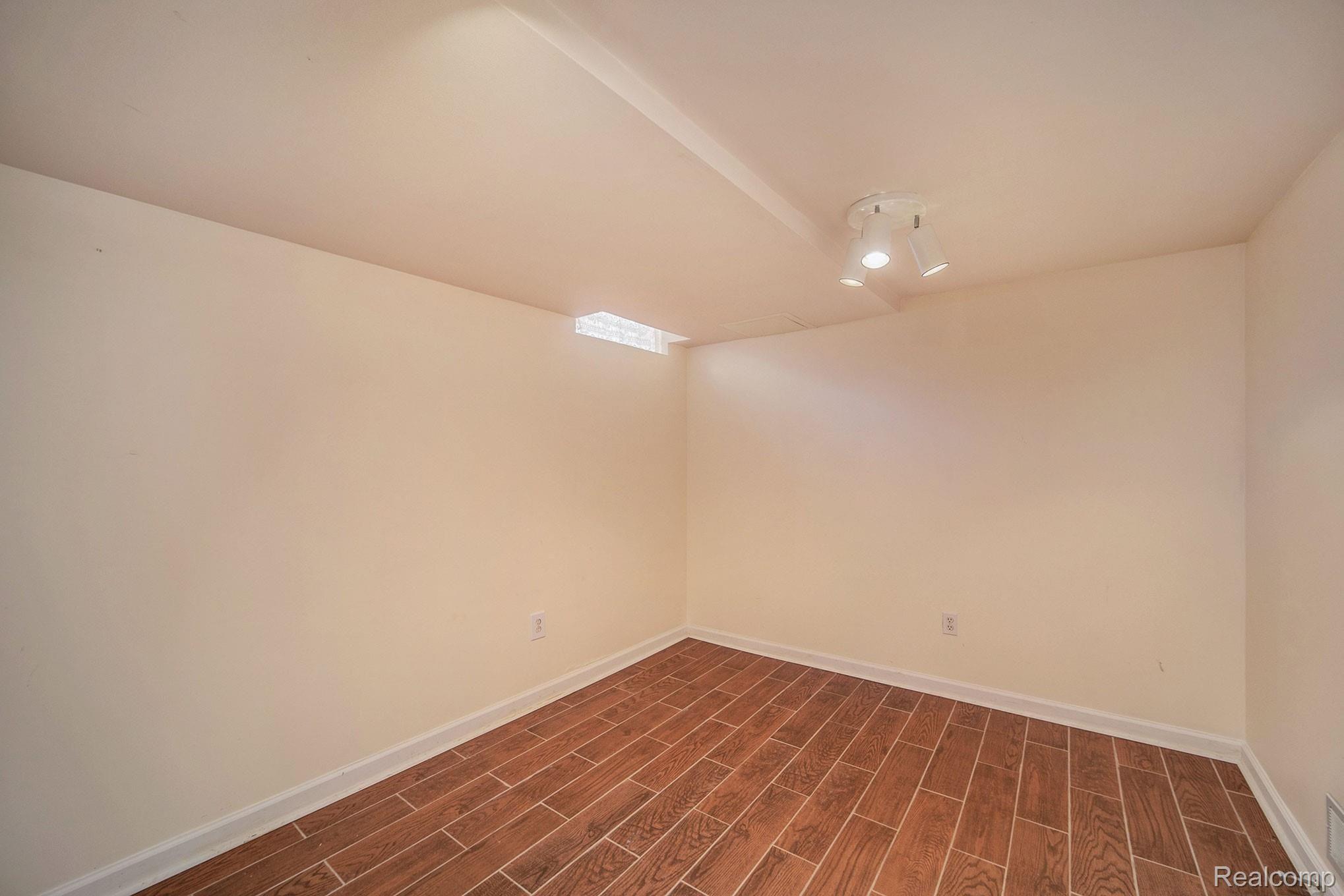 3443 Crooks Road Royal Oak, MI 48073 - Photo 21 of 30 The finished lower level is an alluring entertainment space with a recreational room & flex room with a generous walk-in-closet.