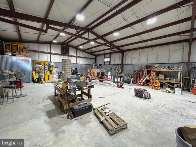 a view of parking garage with cars
