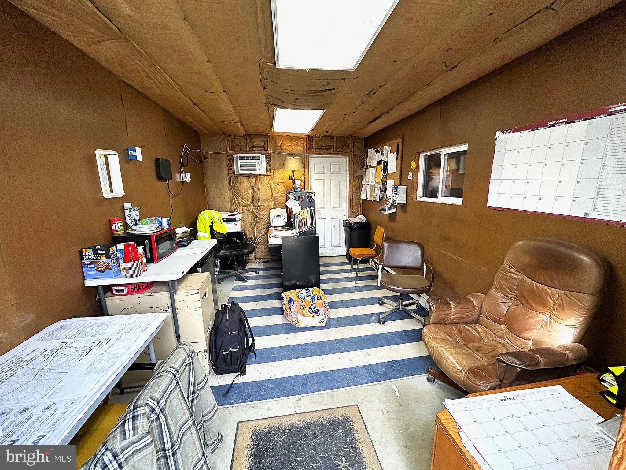 719 Taylor Street Sharptown, MD 21861 - Photo 8 of 10 a living room with furniture and a table