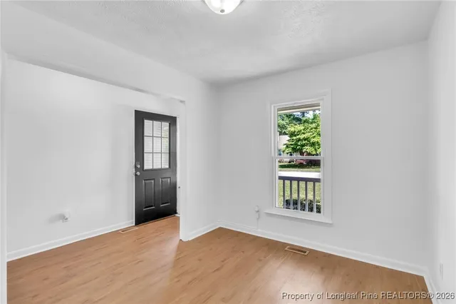 an empty room with windows