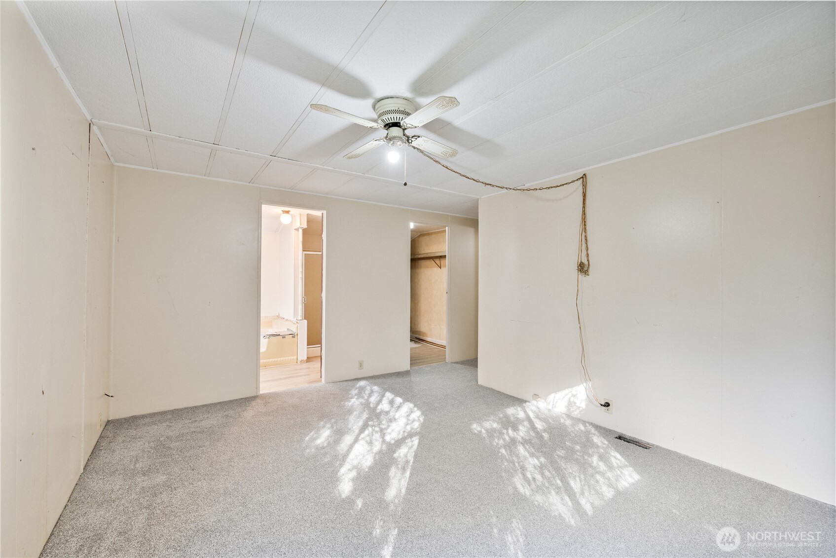 8908 Northeast Etna Road Woodland, WA 98674 - Photo 13 of 37 a view of a big room with closet and fan