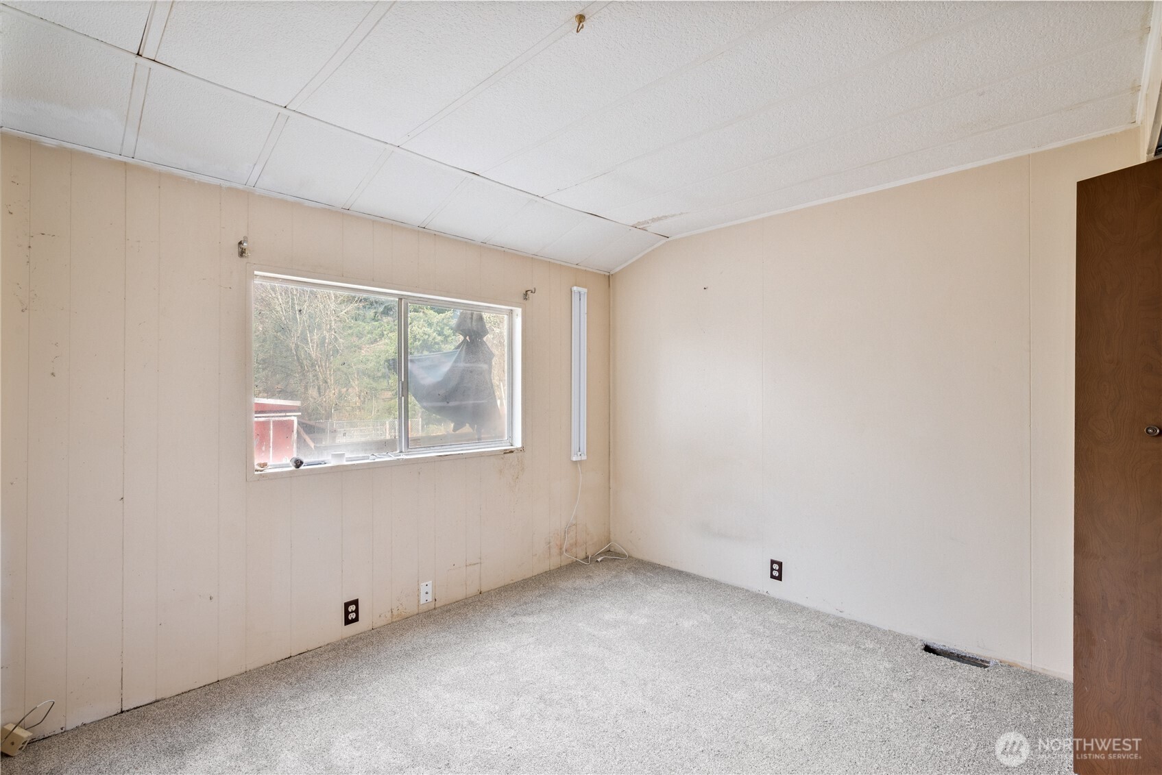 8908 Northeast Etna Road Woodland, WA 98674 - Photo 16 of 37 a view of an empty room with window