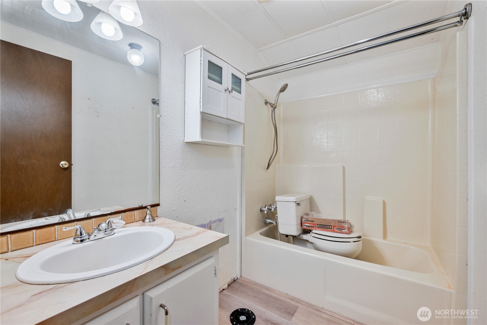 8908 Northeast Etna Road Woodland, WA 98674 - Photo 20 of 37 a bathroom with a sink and a mirror