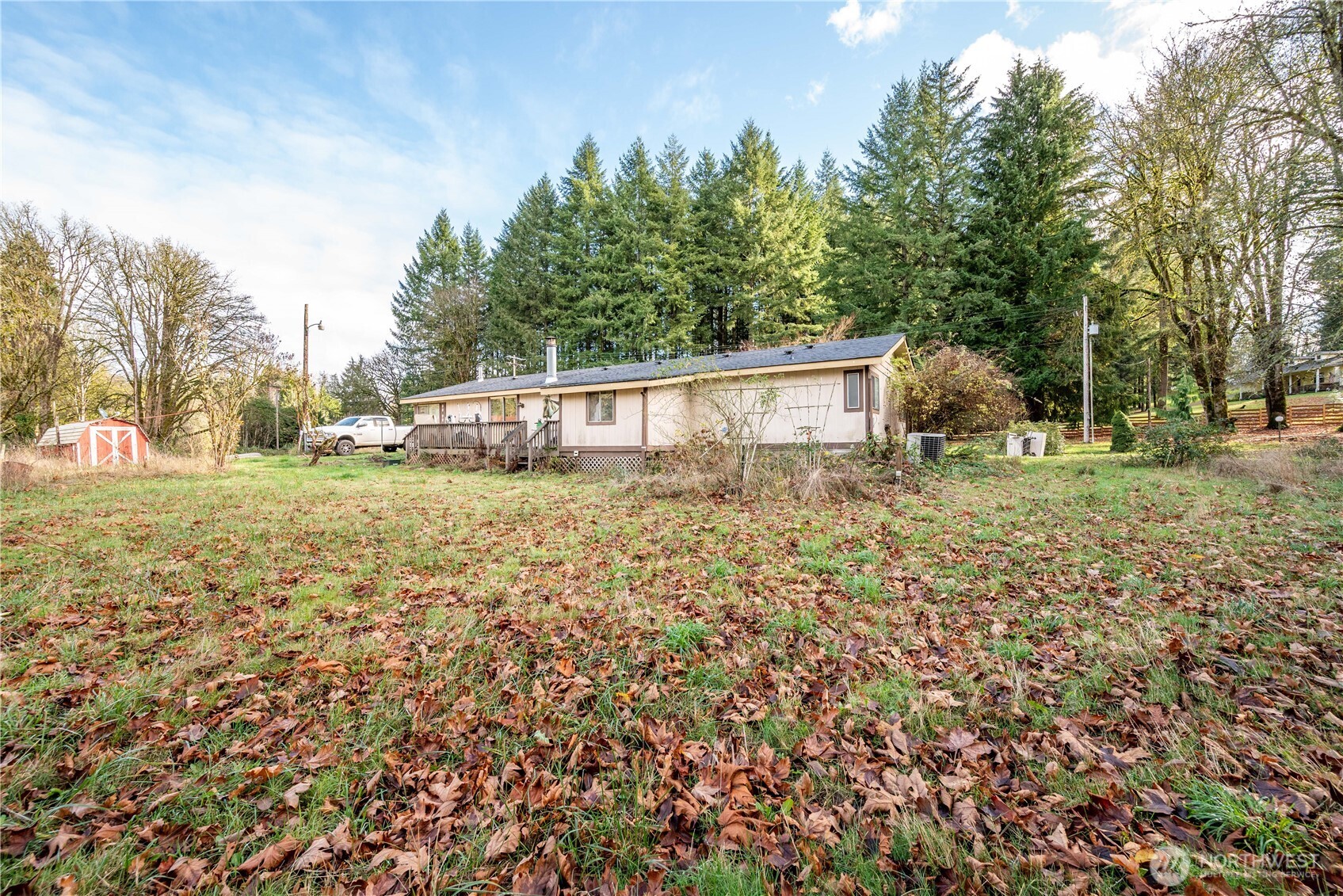 8908 Northeast Etna Road Woodland, WA 98674 - Photo 27 of 37 a view of a house with a yard