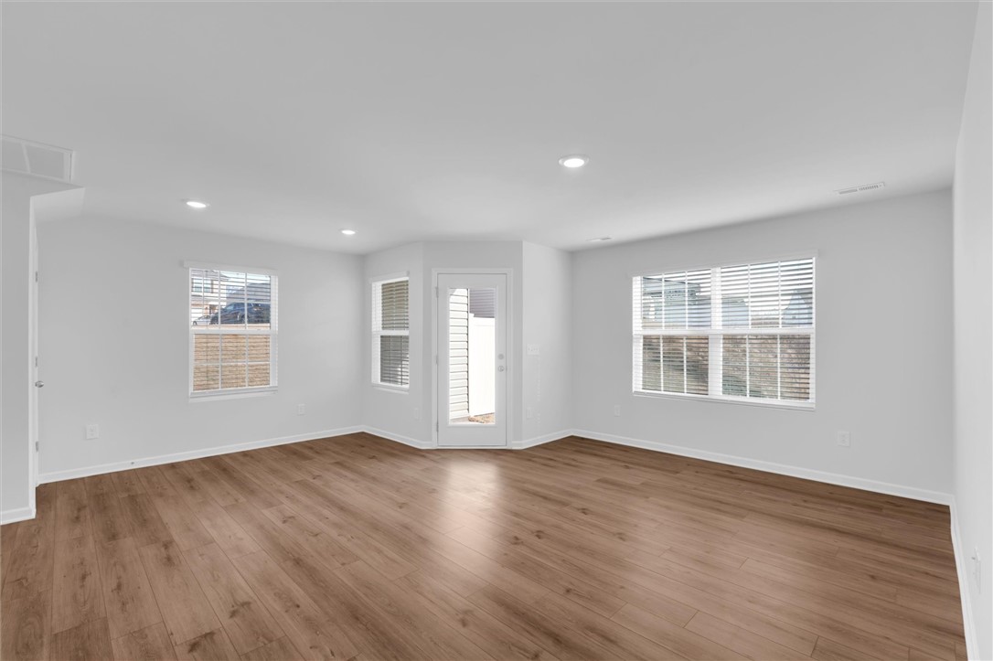 515 Brasstown Court Pendleton, SC 29670 - Photo 3 of 25 This bright living area features abundant natural light and beautiful LVP flooring.