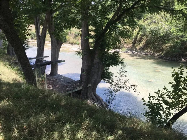 a view of a yard with an outdoor space