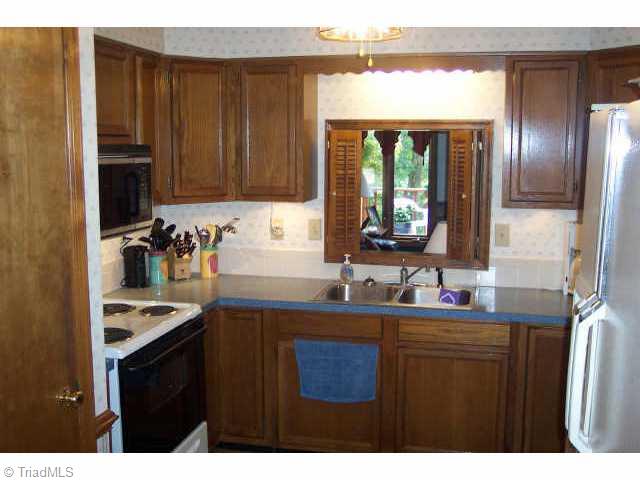 2008 Winding Ridge Road Winston-Salem, NC 27127 - Photo 2 of 9 Other. Kitchen with pass through to living room