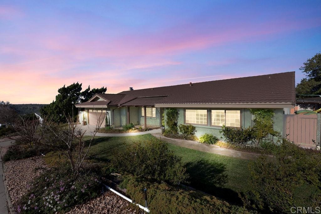 2208 Windmill View Road El Cajon, CA 92020 - Photo 1 of 1 a front view of a house with garden