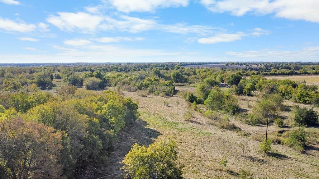2353 County Road 4225 Enloe, TX 75441 - Photo 2 of 11 a view of a city with mountains in the background