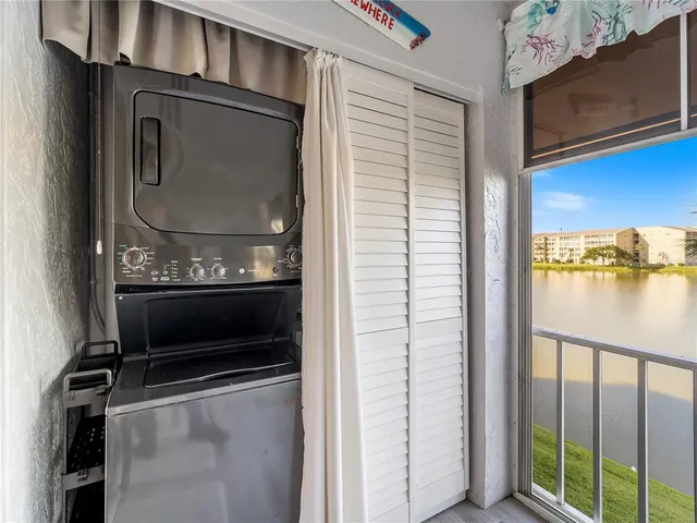 a very nice looking room with wooden floor and furniture