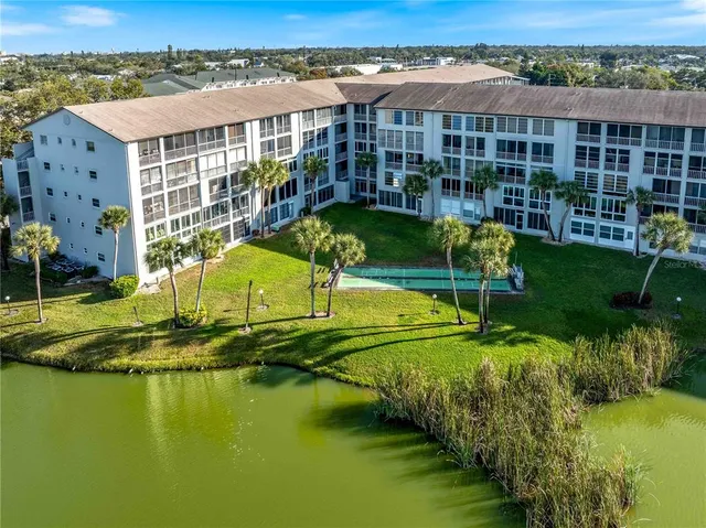 an aerial view of a house with a garden