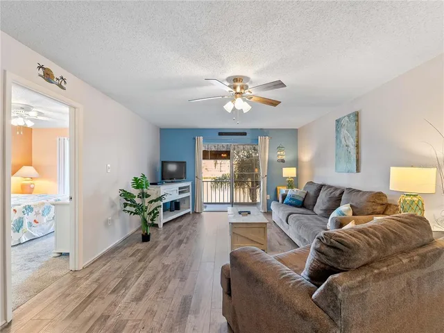 a living room with furniture and window