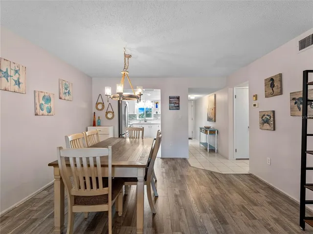 a kitchen with cabinets appliances and a sink