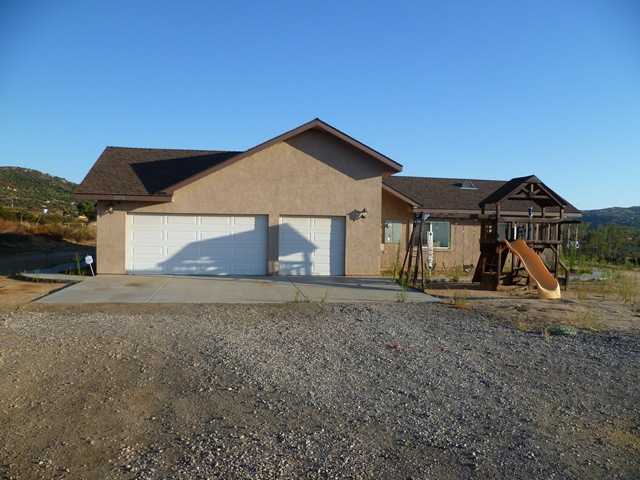 22178 Japatul Valley Road Alpine, CA 91901 - Photo 2 of 20 entrance to garage on the side