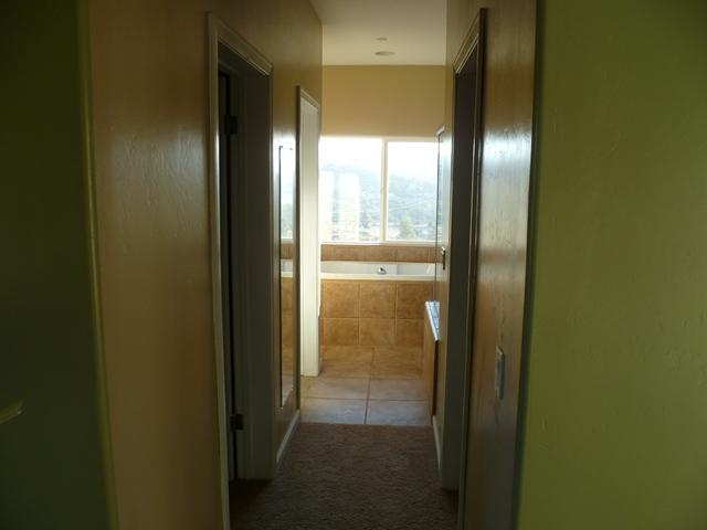 22178 Japatul Valley Road Alpine, CA 91901 - Photo 10 of 20 master bedroom to master bath