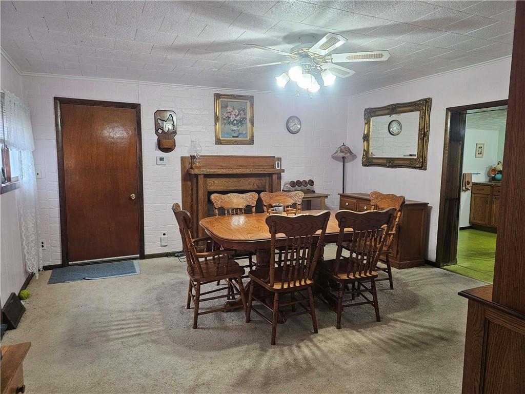 377 Crabapple Road Smock, PA 15480 - Photo 3 of 11 a view of a dining room and livingroom with furniture