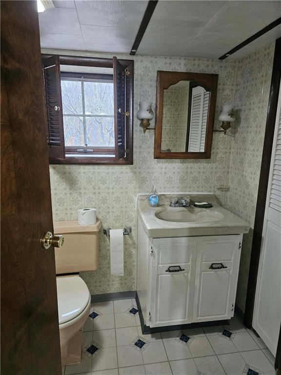 377 Crabapple Road Smock, PA 15480 - Photo 7 of 11 a bathroom with a toilet sink and mirror