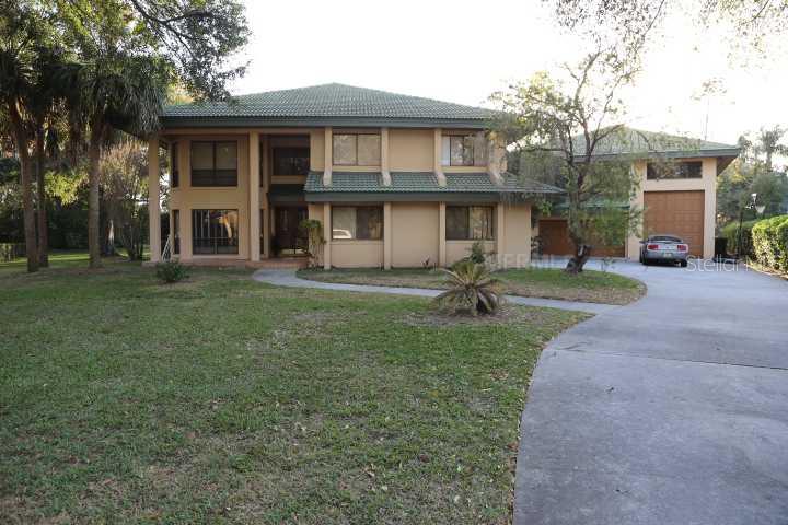 7926 Summer Ridge Place Orlando, FL 32819 - Photo 1 of 1 Exterior Front