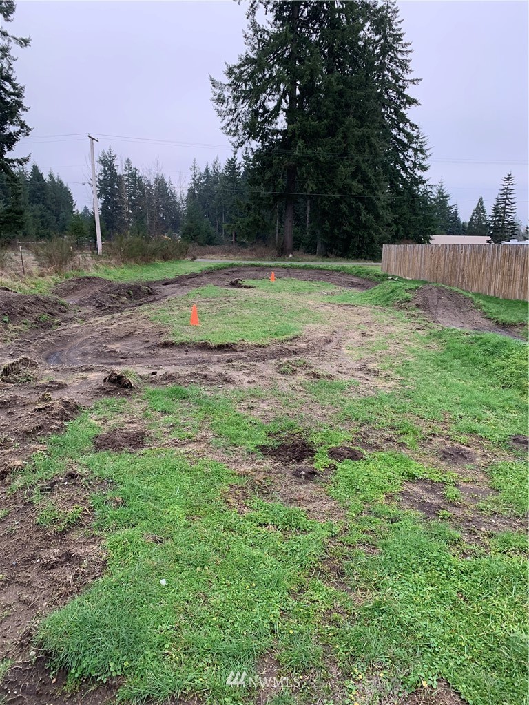 10530 School Land Road Southwest Rochester, WA 98579 - Photo 26 of 27 a view of outdoor space with deck and yard
