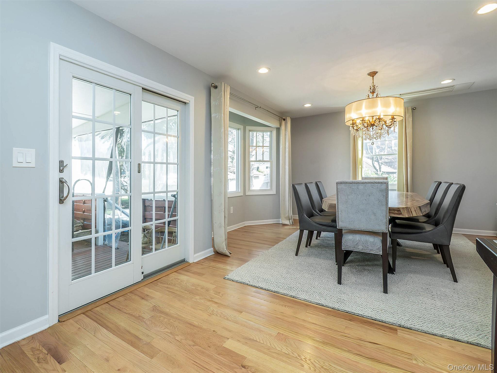 17 Winans Place Locust Valley, NY 11560 - Photo 13 of 34 a view of a dining room with furniture window and outside view