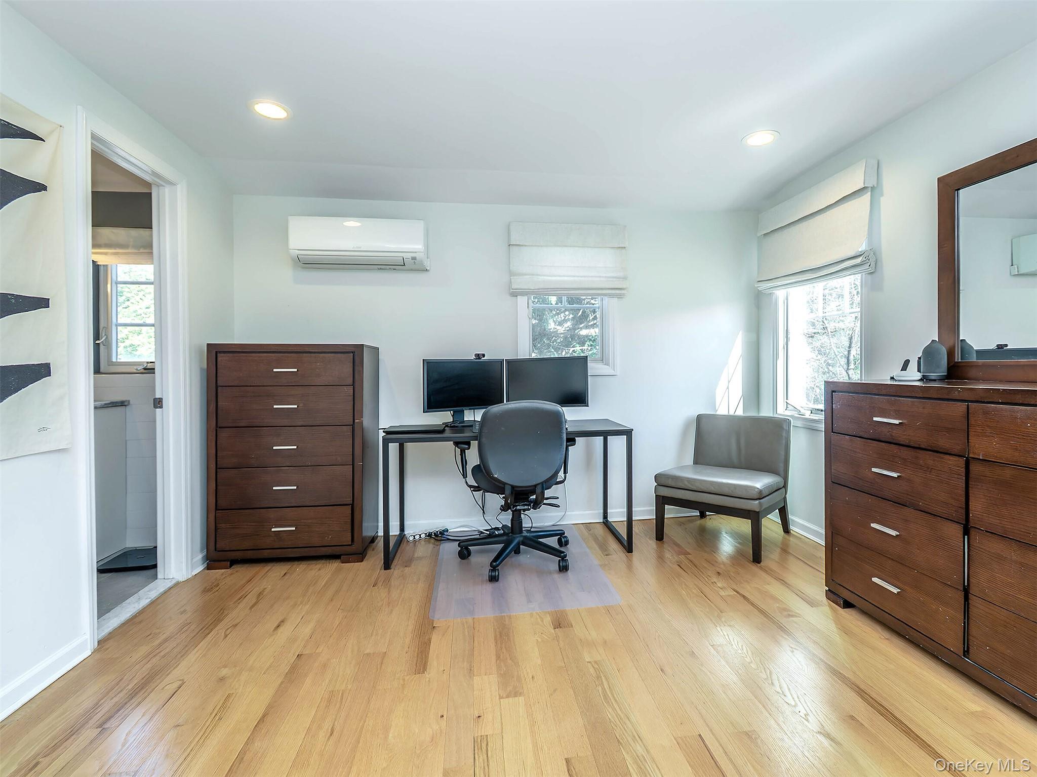 17 Winans Place Locust Valley, NY 11560 - Photo 23 of 34 a view of a workspace with furniture and a window