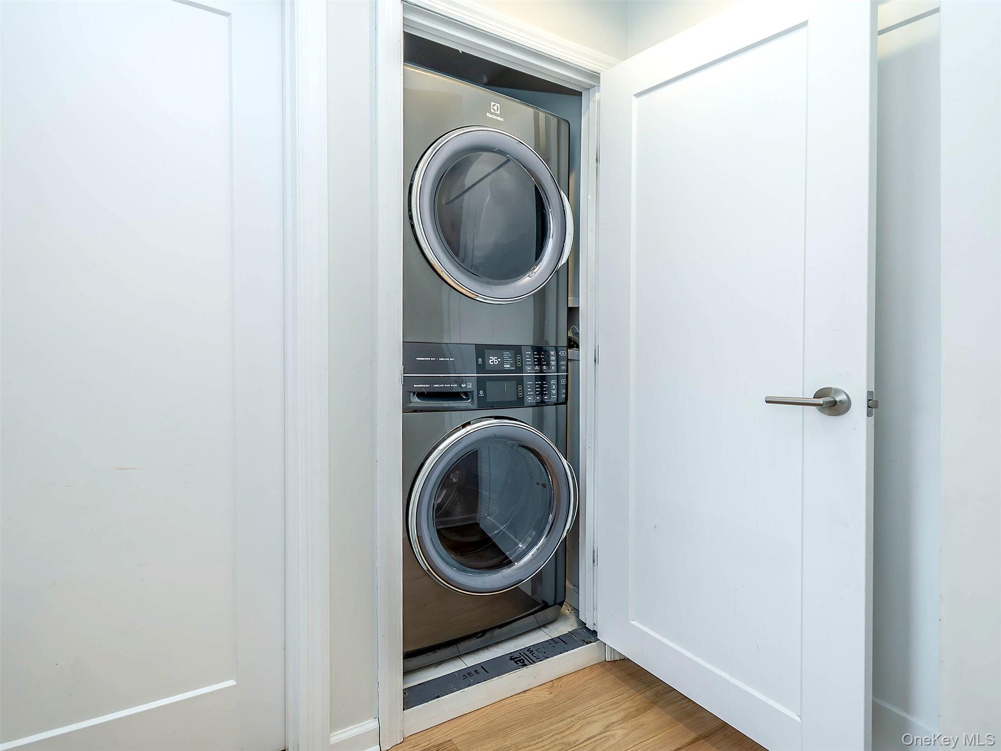 17 Winans Place Locust Valley, NY 11560 - Photo 29 of 34 a utility room with dryer and washer