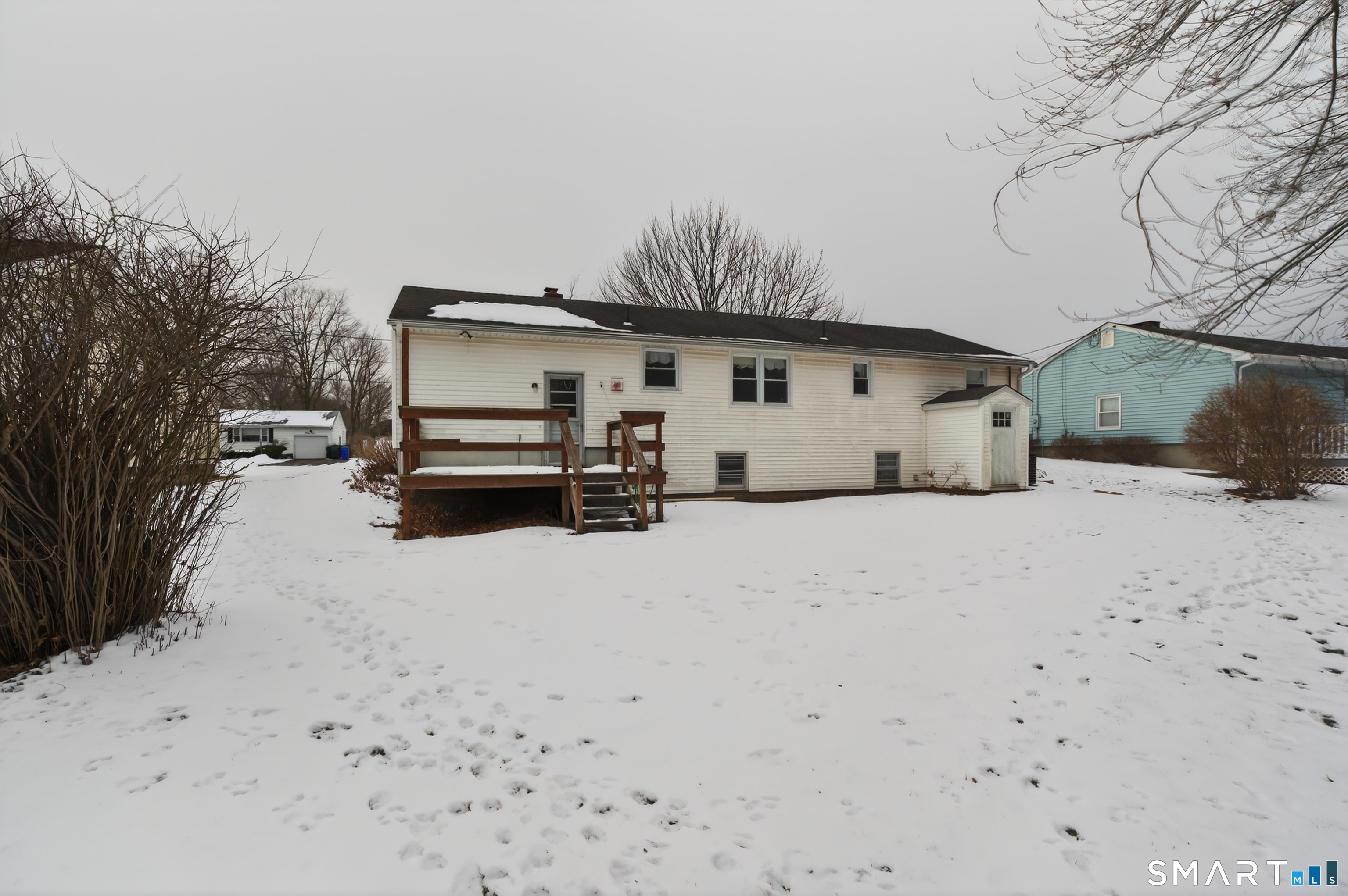 40 Quincy Lane Newington, CT 06111 - Photo 19 of 25 a view of a house with a snow in the snow