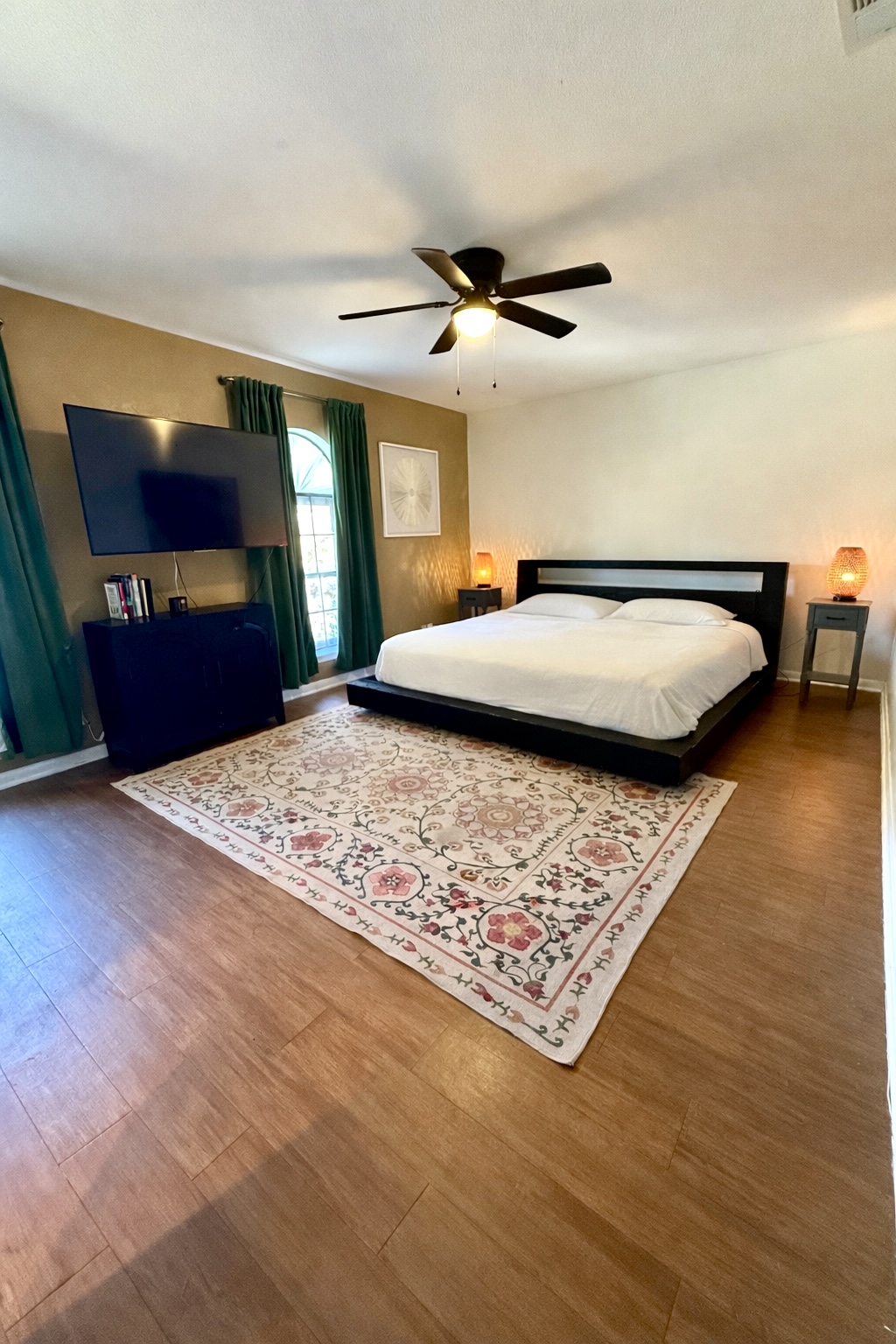 9507 Sherbrooke Street Austin, TX 78729 - Photo 13 of 29 a view of a big room with wooden floor and windows