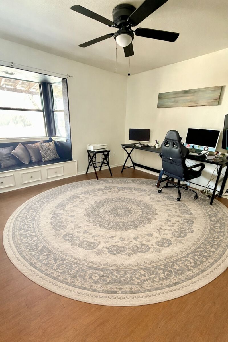 9507 Sherbrooke Street Austin, TX 78729 - Photo 15 of 29 a living room with couch and a large window