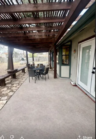 a view of a field with trees