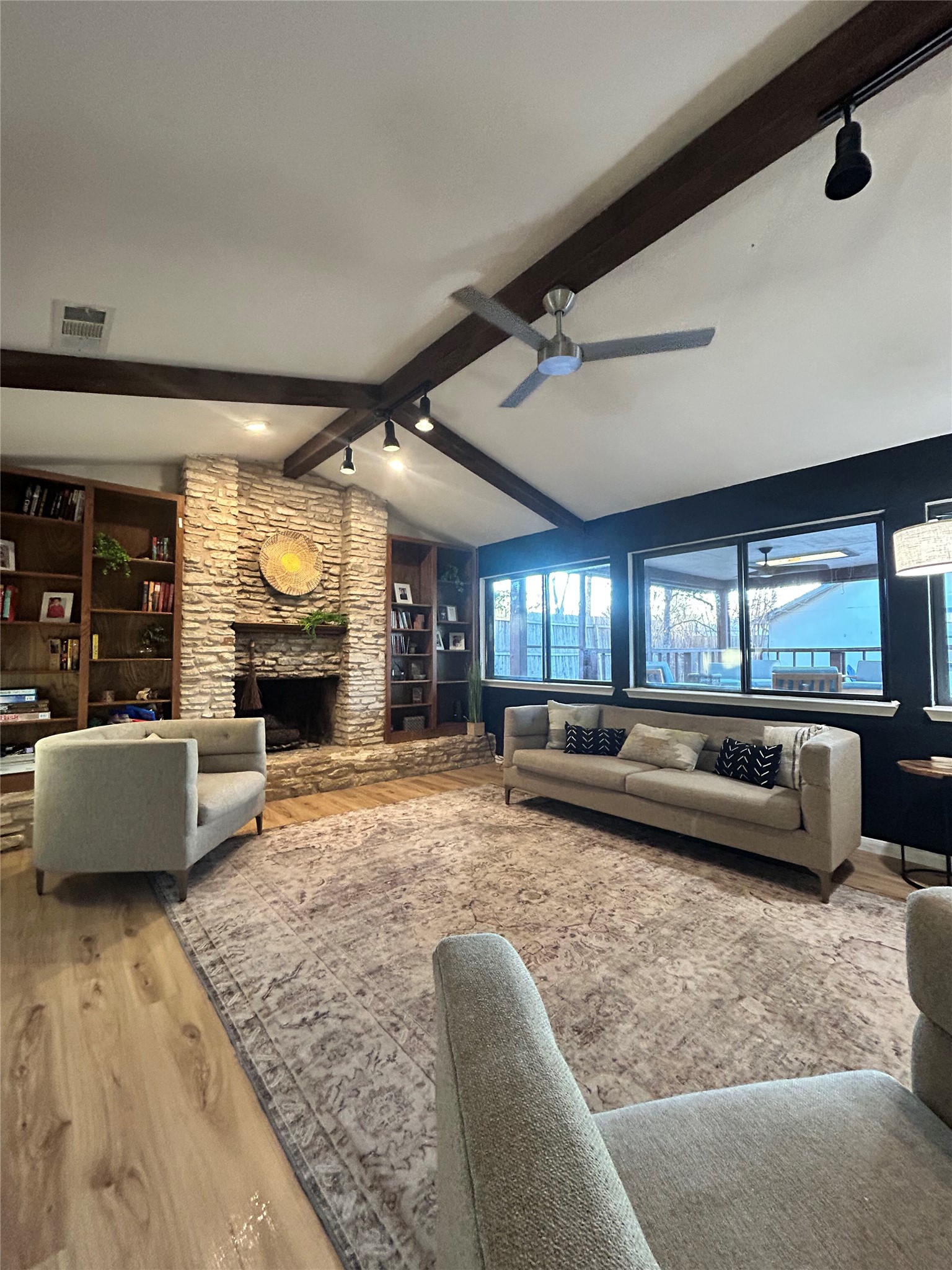9507 Sherbrooke Street Austin, TX 78729 - Photo 3 of 29 a living room with fireplace furniture and a large window