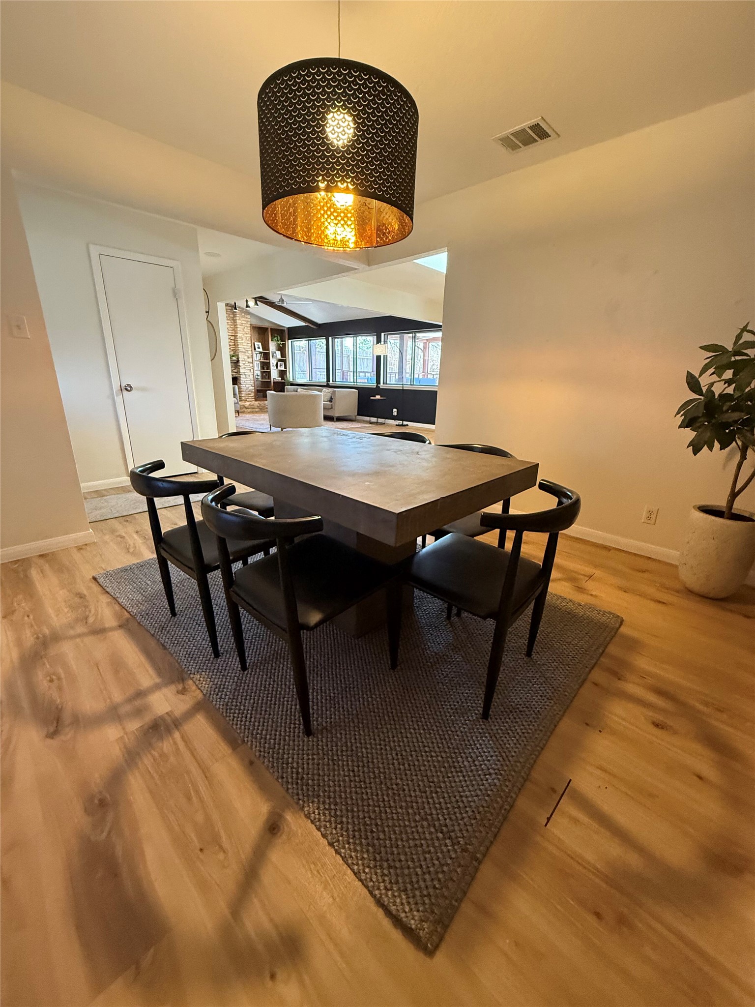 9507 Sherbrooke Street Austin, TX 78729 - Photo 4 of 29 a room with furniture and wooden floor