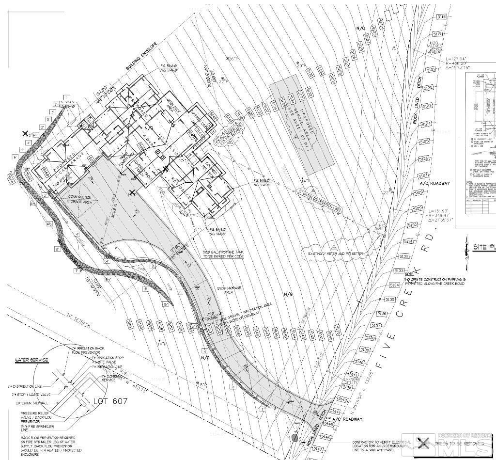 87 Five Creek Road Gardnerville, NV 89460 - Photo 37 of 40 a picture of white house with a snow on the wall