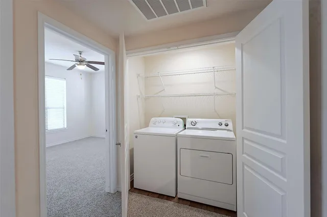a view of utility room with washer and dryer