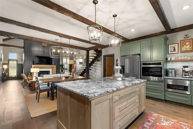 a bedroom with a balcony a bed and a couch