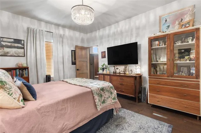 a front view of a house with a yard and a garage