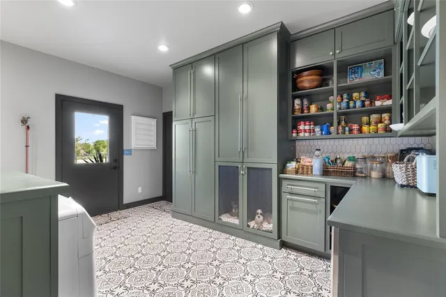 a view of an entryway with wooden floor