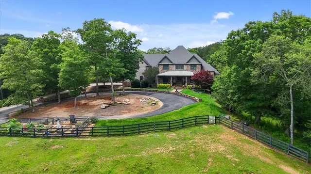 a view of a swimming pool with a patio