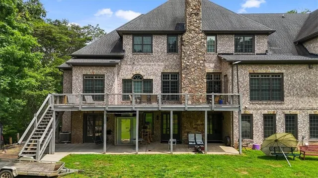 a view of a golf course with a lake view