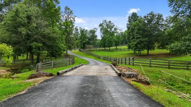 a view of a golf course with a lake