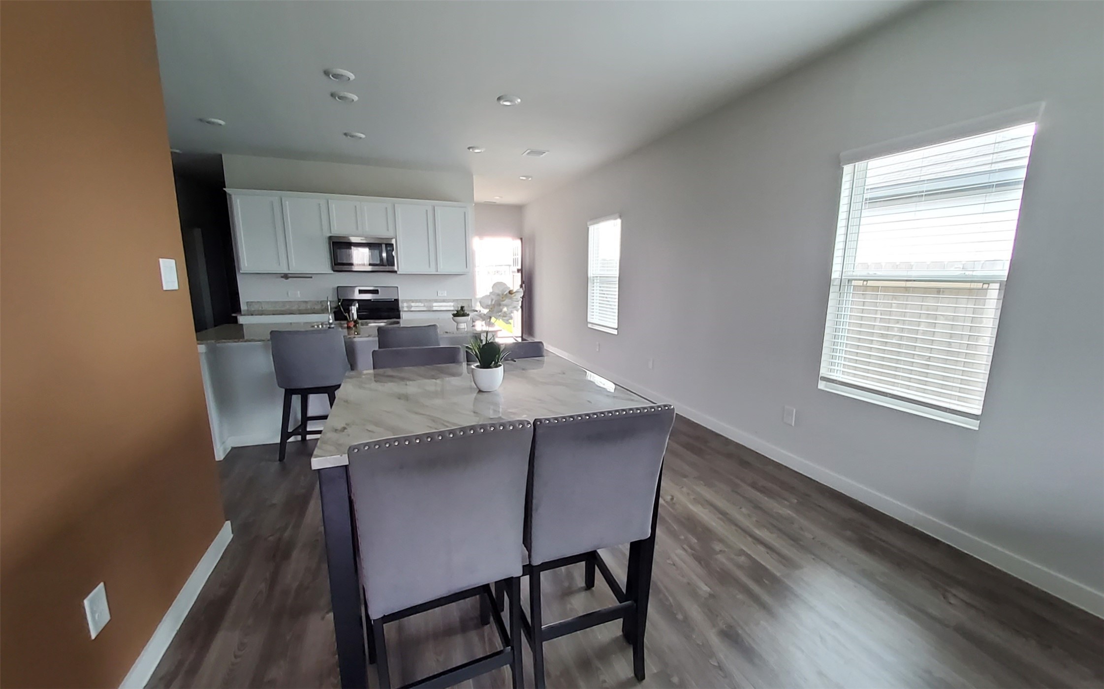17359 King Eider Road Waller, TX 77484 - Photo 21 of 22 a view of a dining room with furniture and window