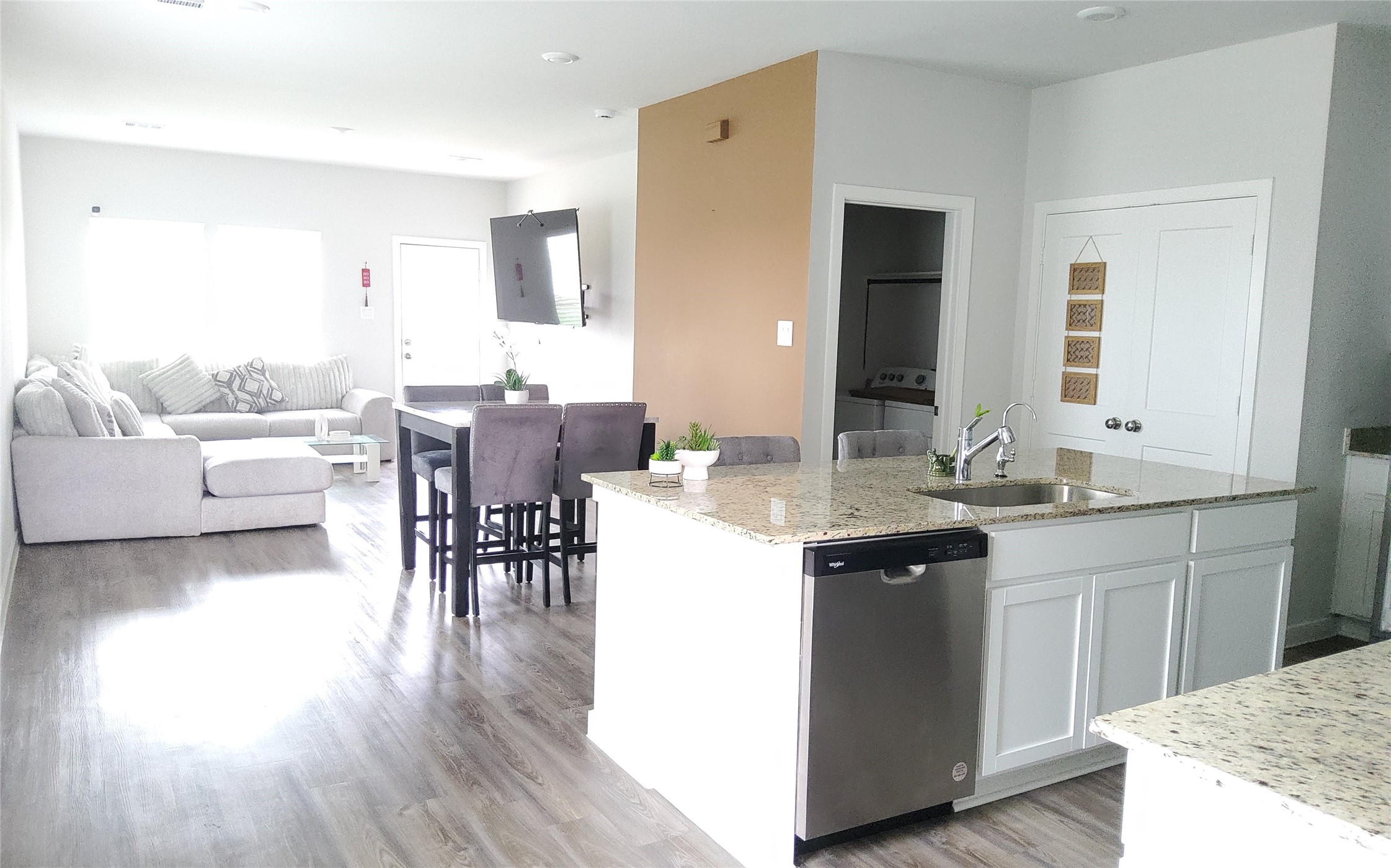 17359 King Eider Road Waller, TX 77484 - Photo 8 of 22 a kitchen with a sink and breakfast area
