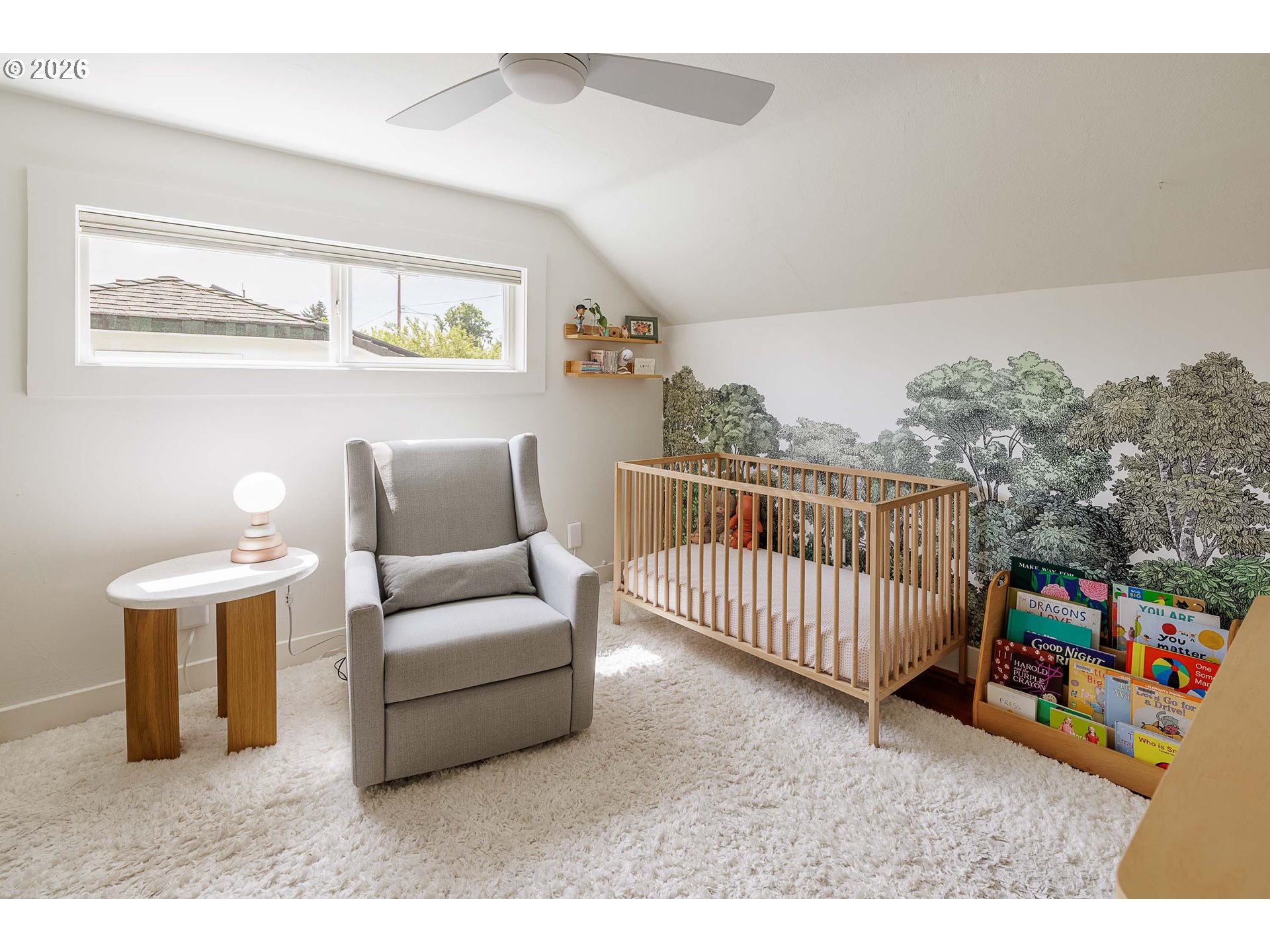 6128 North Denver Avenue Portland, OR 97217 - Photo 23 of 32 a living room with furniture and a window