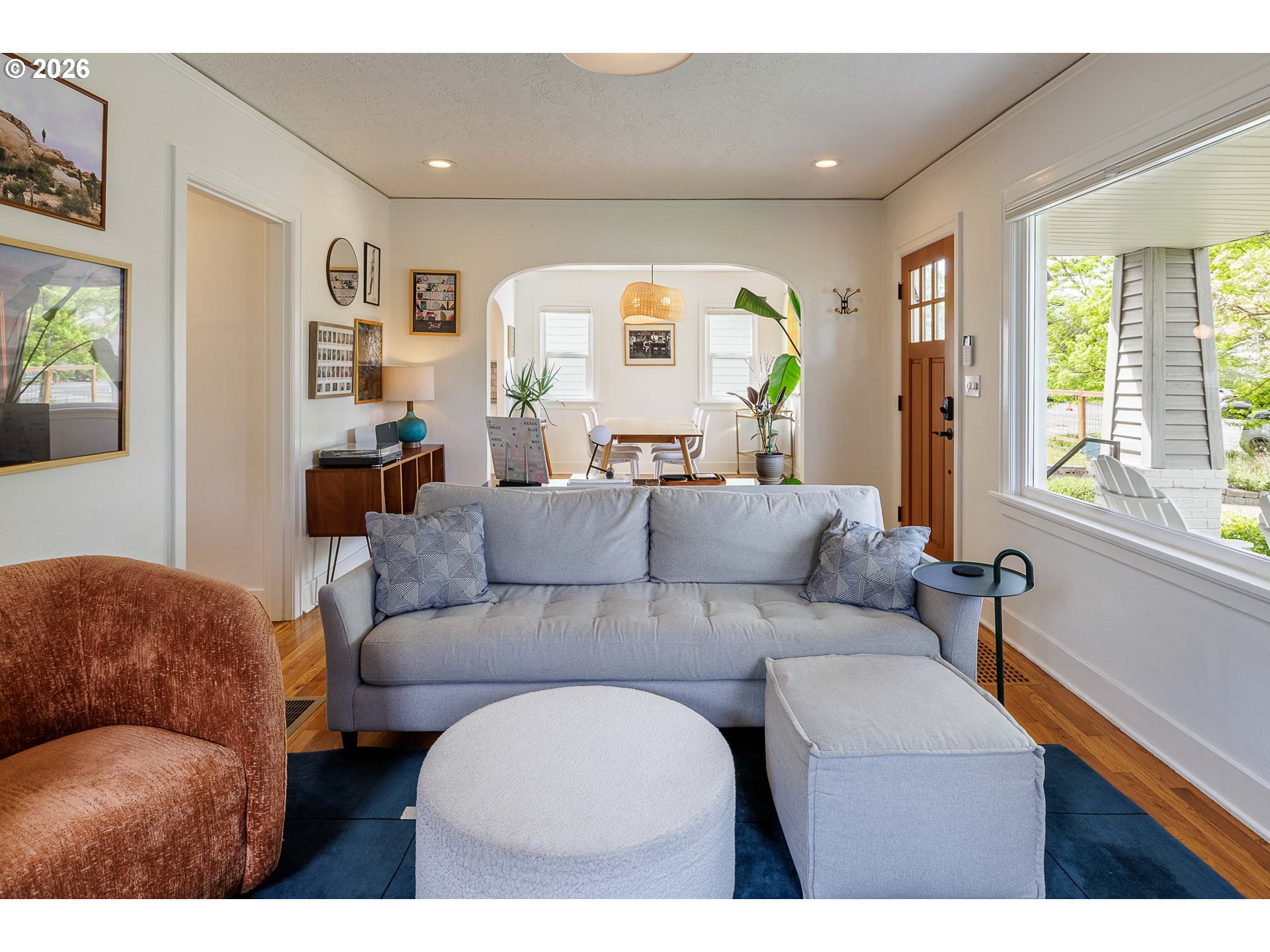 6128 North Denver Avenue Portland, OR 97217 - Photo 6 of 32 a living room with furniture and a large window