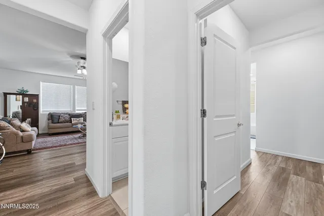 a view of a livingroom from a hallway