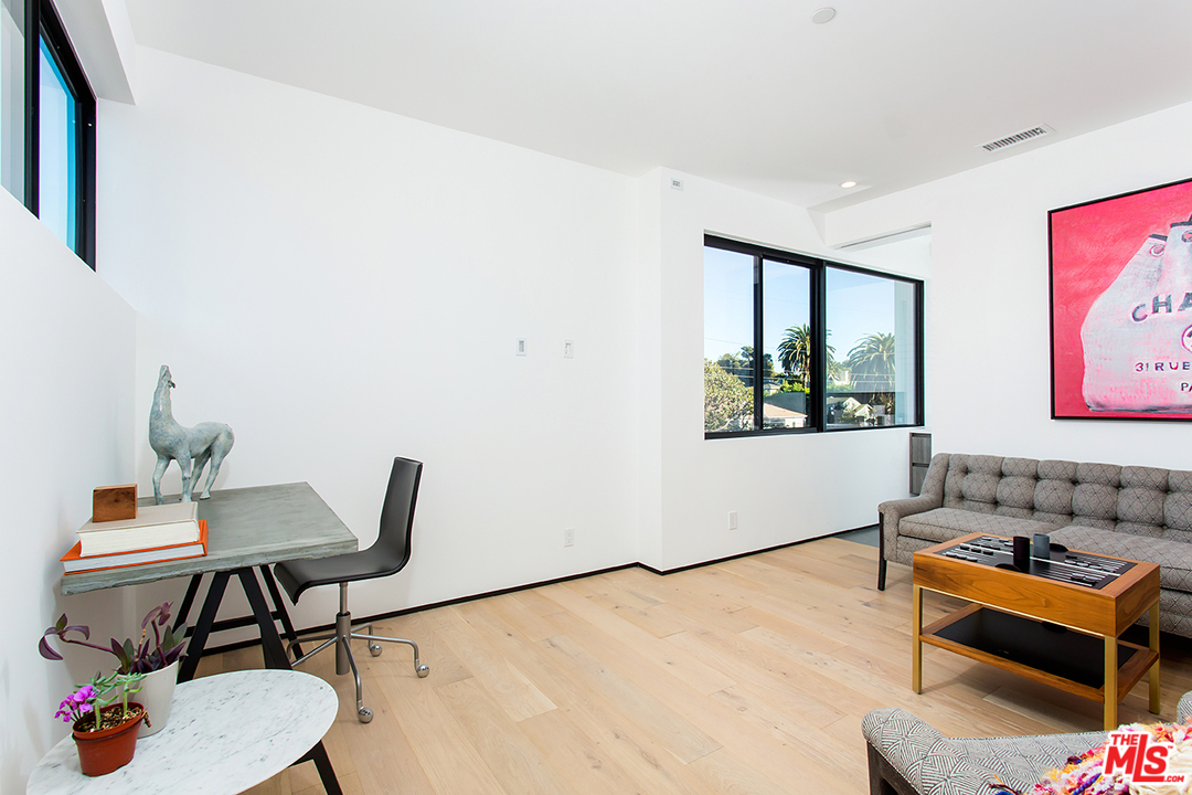 2021 Walnut Avenue Venice, CA 90291 - Photo 18 of 26 a living room with furniture and wooden floor